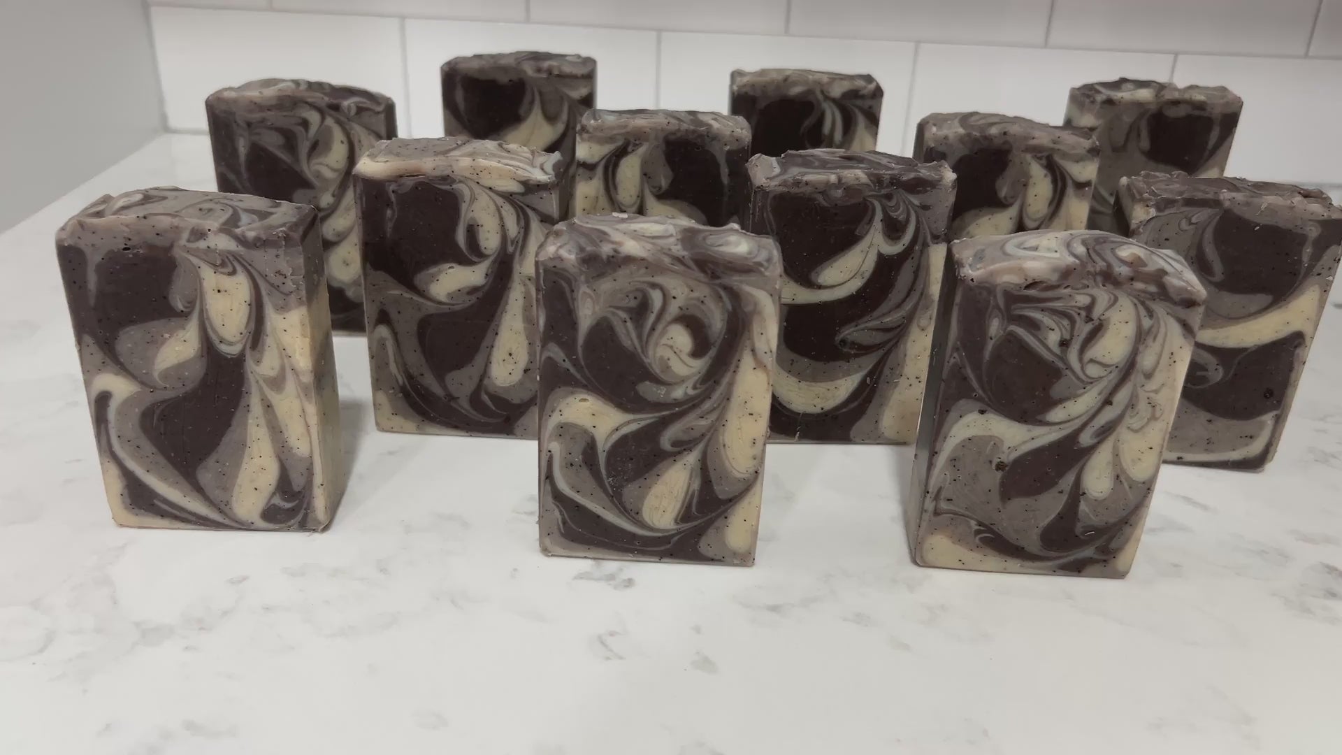 Bars of coffee soap with various shades of brown and cream-colored swirls. They smell like a cafe latte, and they are inspired by Captain Janeway's obsession with coffee on Star Trek: Voyager and Star Trek: Prodigy.