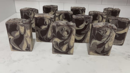 Bars of coffee soap with various shades of brown and cream-colored swirls. They smell like a cafe latte, and they are inspired by Captain Janeway's obsession with coffee on Star Trek: Voyager and Star Trek: Prodigy.