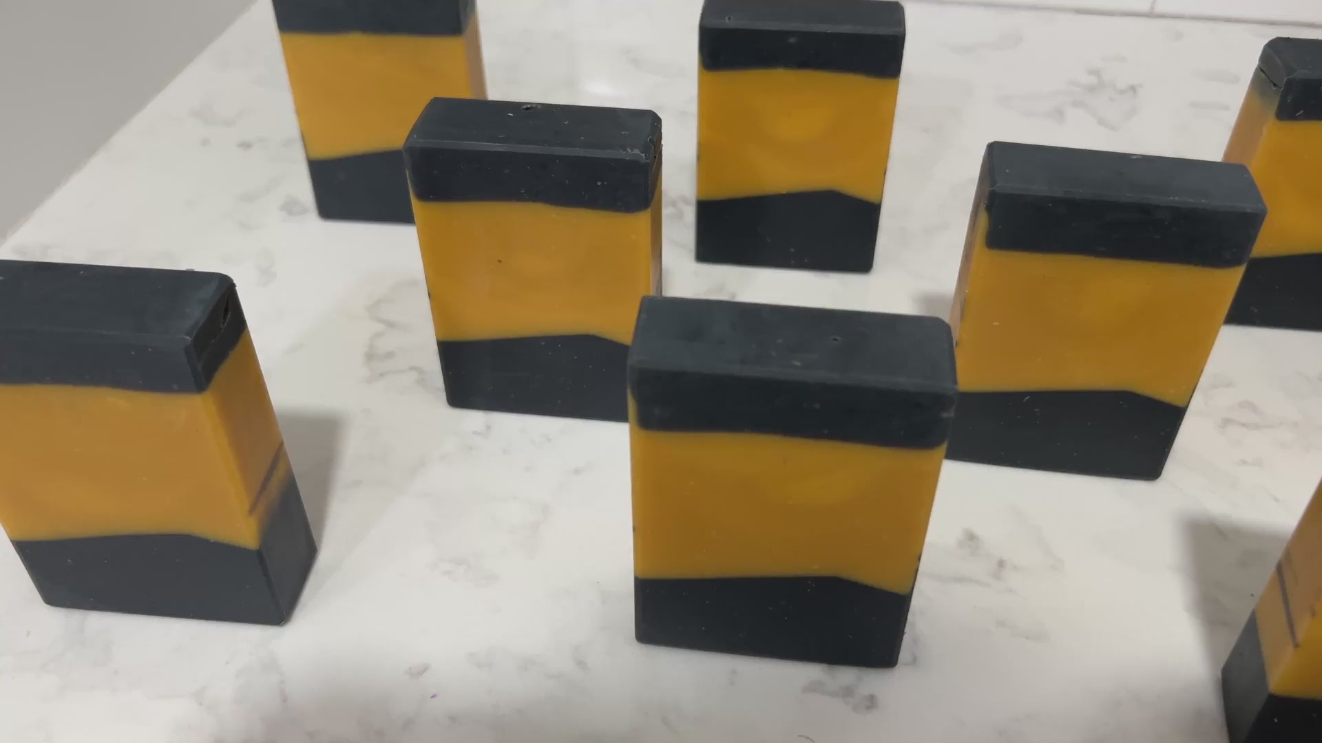 Bars of gold and black soap inspired by the design of the uniforms on Star Trek: TNG. This soap is scented with a fragrance called Blue Skies, in honor of Data's famous rendition of the song. It smells like clean cotton.