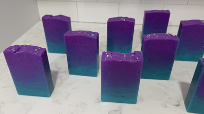 Gradient purple to blue soap bars on a white background. The colors are inspired by Murf from Star Trek: Prodigy, and the scent is fresh mango.