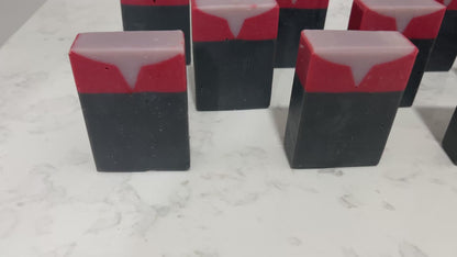 Bars of black, red, and purplish-grey soap inspired by Captain Kathryn Janeway from Star Trek: Voyager. It is scented with an espresso martini fragrance.