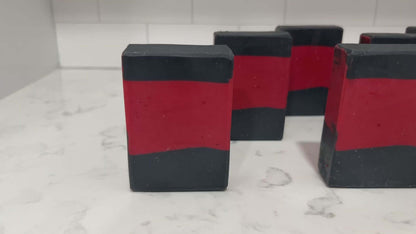 Bars of red and black soap inspired by the iconic uniforms worn on Star Trek: The Next Generation. The scent is Earl Grey tea, Captain Picard's favorite beverage.