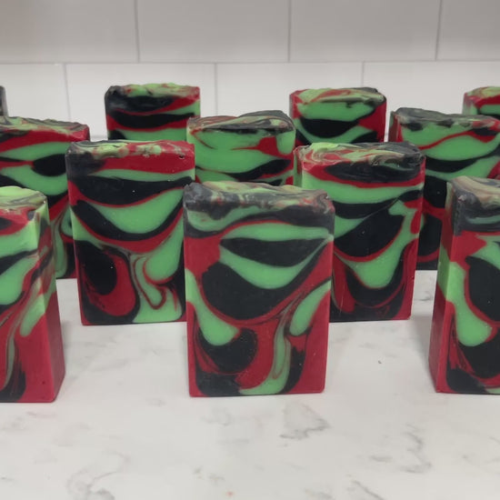 Bars of soap with drop swirls of red, black and green, inspired by the colors of Uhura's uniform and her iconic hoop earrings.