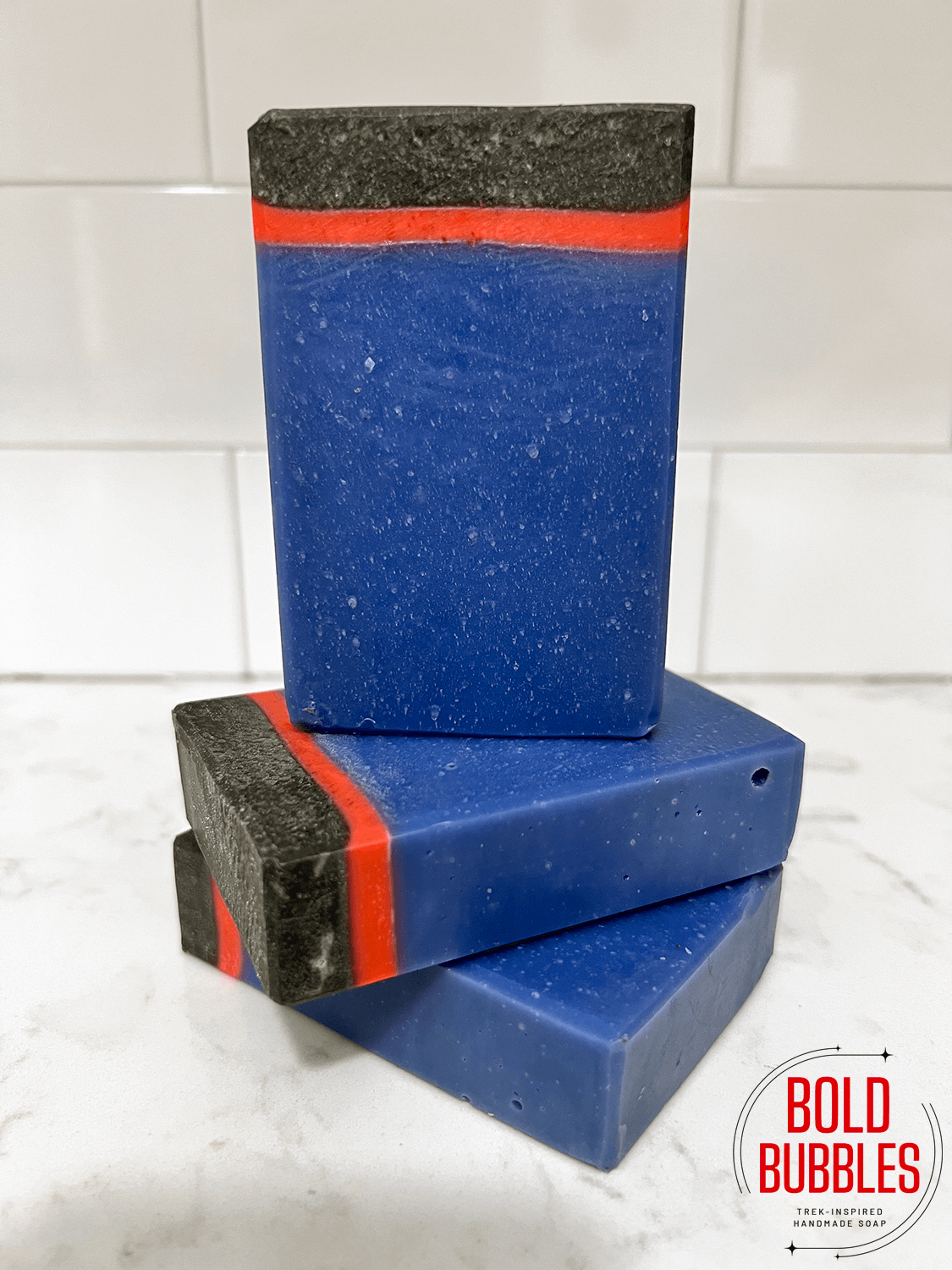 A blue, black and red bar of soap inspired by the uniform style worn by crew members in the Star Trek show "Enterprise."
