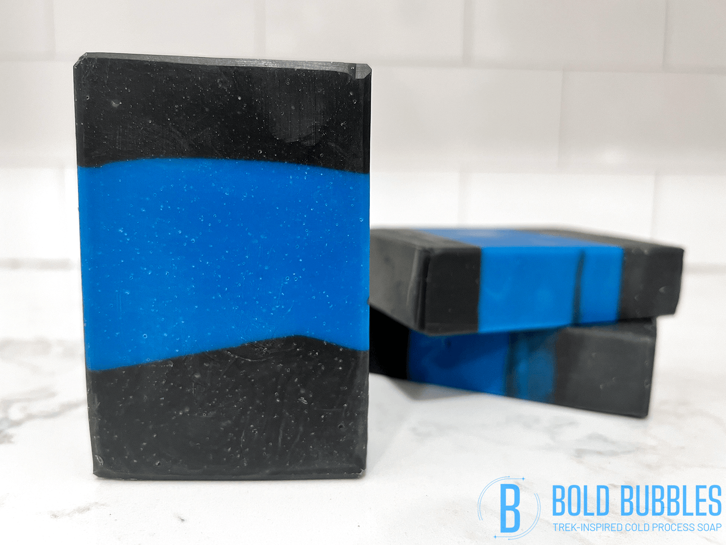 A blue and black bar of soap inspired by the uniform design on Star Trek: The Next Generation.