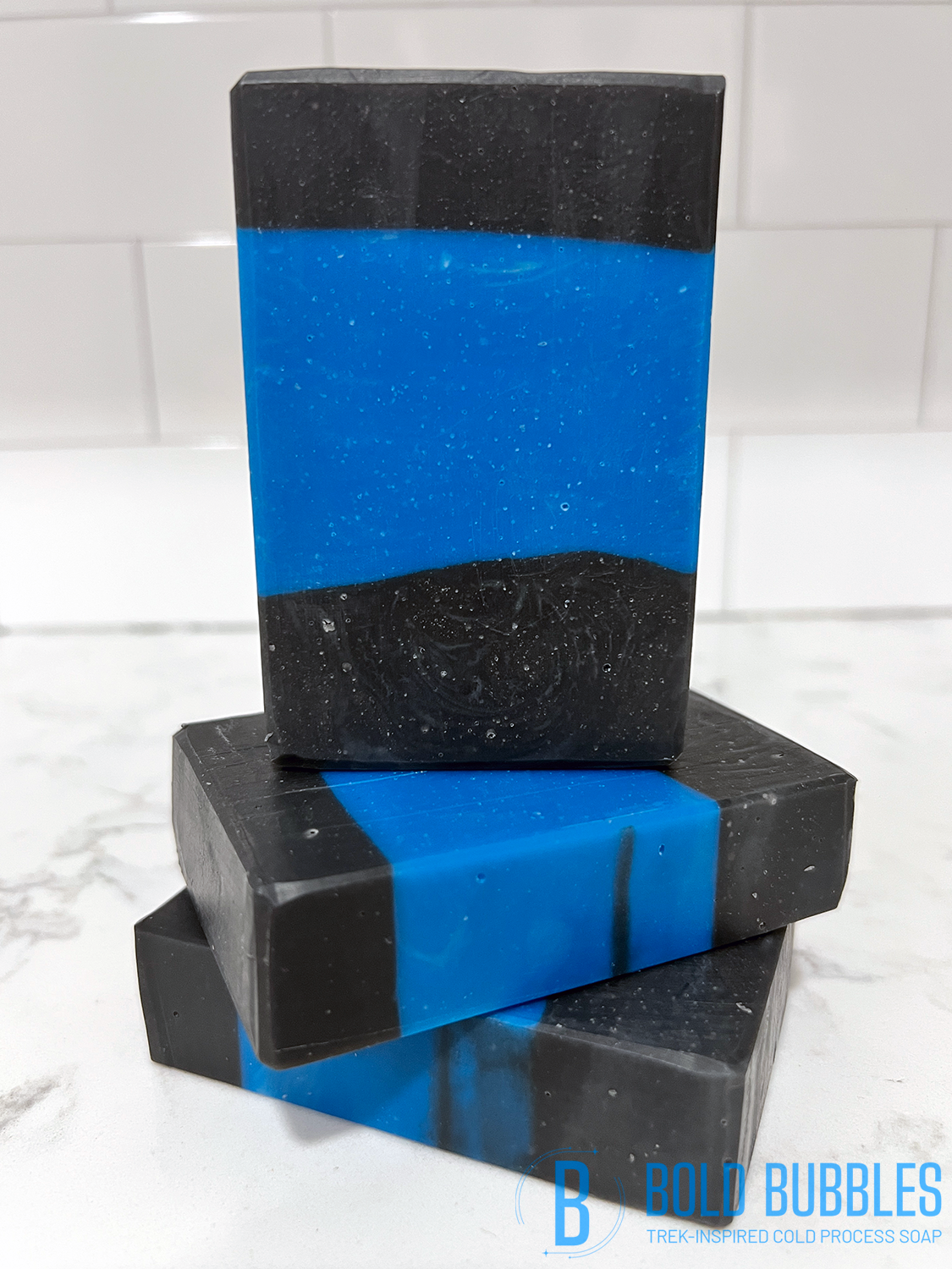 A blue and black bar of soap inspired by the uniform design on Star Trek: The Next Generation.