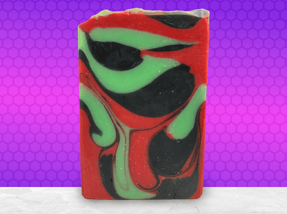 A bar of soap with drop swirls of red, black and green, inspired by the colors of Uhura's uniform and her iconic hoop earrings.