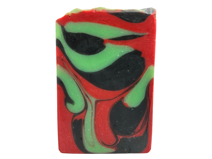 A bar of soap with drop swirls of red, black and green, inspired by the colors of Uhura's uniform and her iconic hoop earrings.