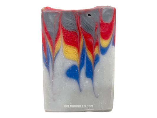 A bar of soap inspired by the grey, blue, yellow, and red sweater Wesley Crusher wore in Star Trek: The Next Generation. The scent is a dynamic unisex blend of citrus, floral, and earthy notes.