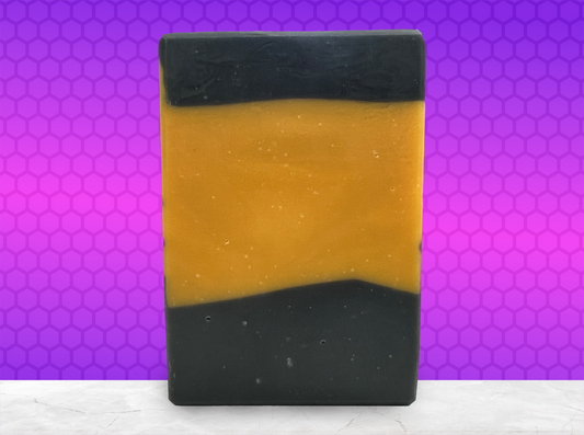 A gold and black bar of soap in the design of the famous TNG-style uniform. The scent is lilac, in honor of Worf.