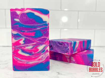 A bar of unscented soap with brightly-colored pink, blue, purple and white swirls. The design was inspired by Zero on Star Trek: Prodigy.