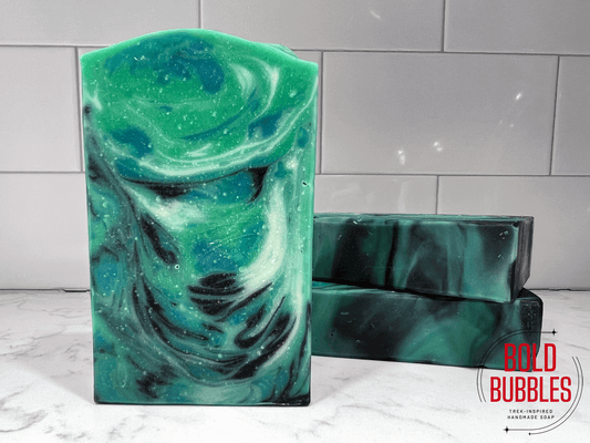 Green, blue, white and black swirled soap that smells like eucalyptus mint.